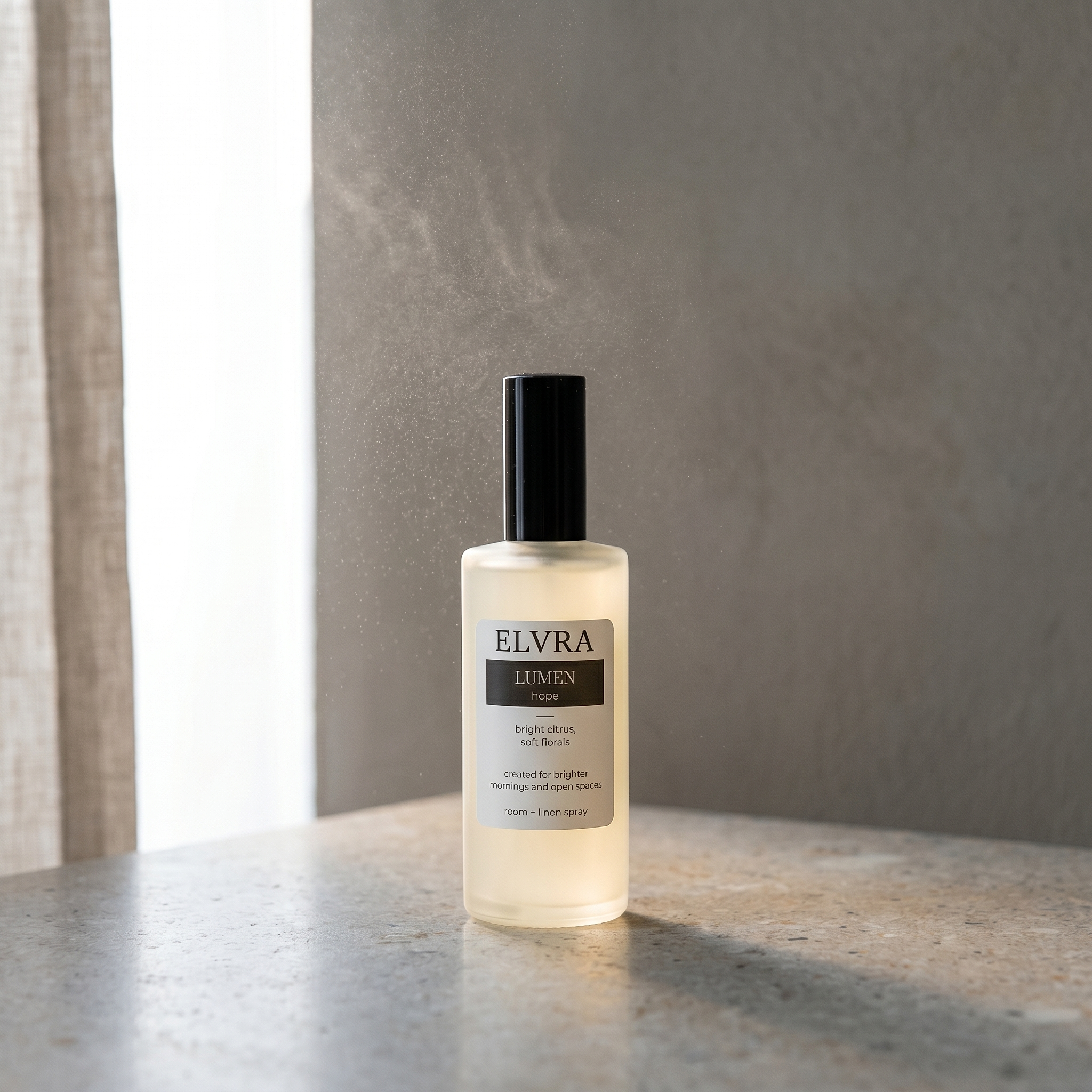 Elvra LUMEN atmosphere mist bottle on pale stone with soft backlight, gray plaster wall, and faint mist in the air.